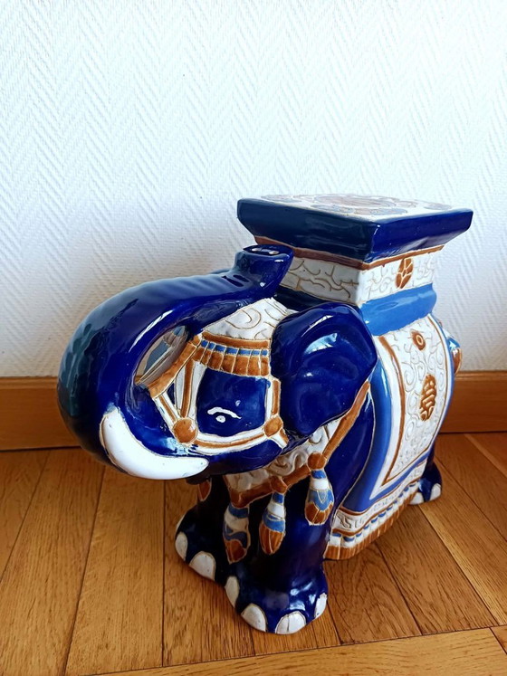 Image 1 of Blauwe keramische olifantenkruk of plantenstandaard