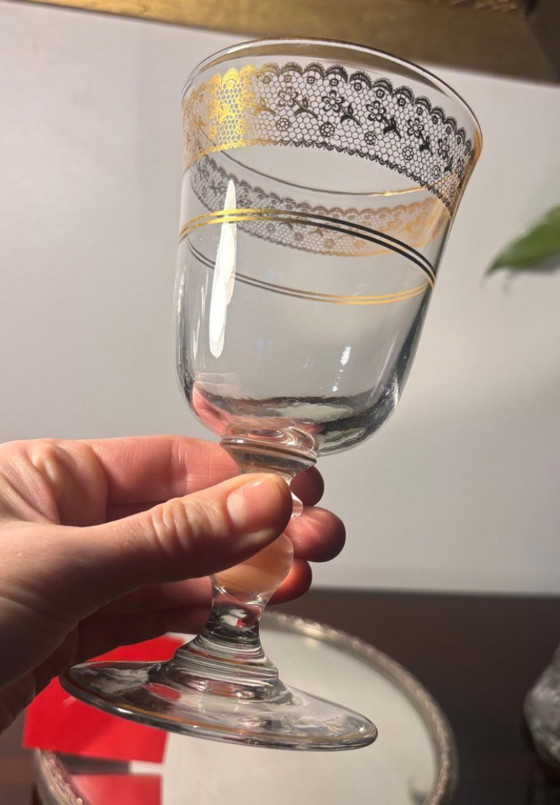 Image 1 of application Baccarat en or sur verre cristal