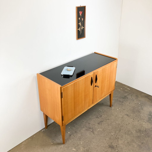 Small sideboard by WK Möbel, light veneer with black glass top, 1950s