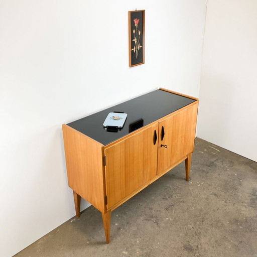 Small sideboard by WK Möbel, light veneer with black glass top, 1950s
