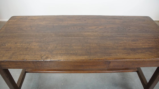 Image 1 of Antique early 19th century French dining table made of oak with 1 drawer