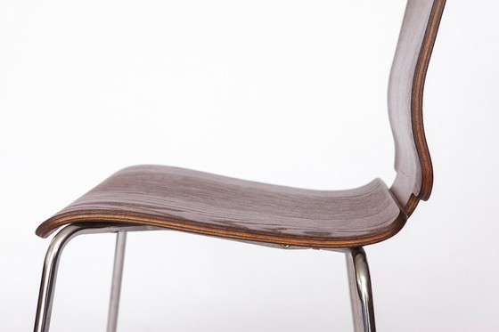 Image 1 of IKEA Gilbert stoel – vintage stapelbare eetkamerstoel uit de jaren 90, zitting van teakhout met chromen poten, set van 3 beschik