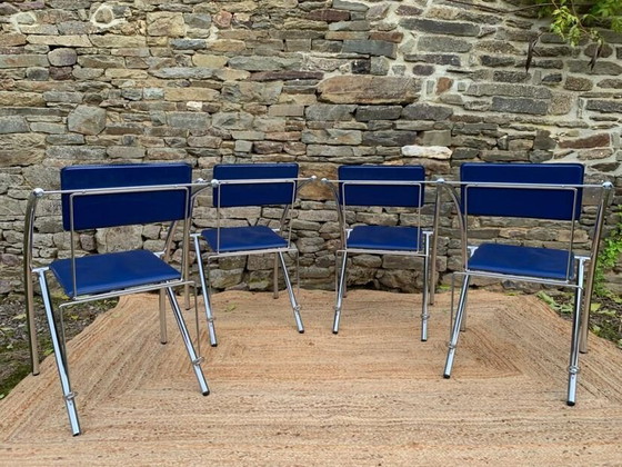 Image 1 of Set van 4 vintage stoelen in blauw imitatieleer en verchroomd metaal