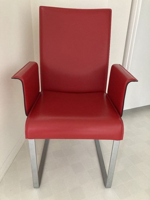 High-quality designer chair in red leather in very good condition