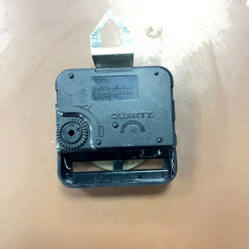 Richter wall clock, brass, openwork, West Germany, 1960s.