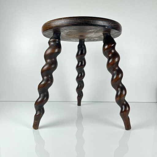 Antique solid wood stool with twisted legs, early 20th century