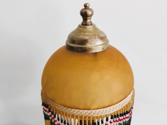 Image 1 of Antieke gouden tafellamp met kwastjes