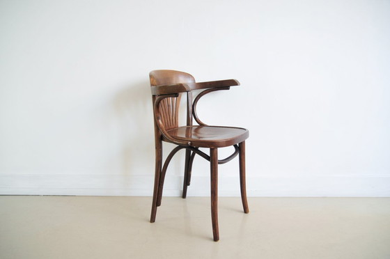 Image 1 of brown wooden bistro chair