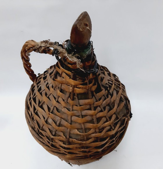 Image 1 of Dame-jeanne ancienne en osier et verre