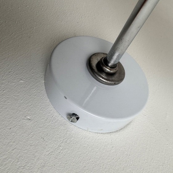 Image 1 of APPLIQUE VINTAGE IN METALLO E OPALINO