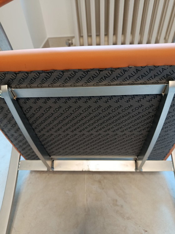 Sedia a sbalzo in pelle arancione Tonon Italia, Sedie da pranzo, Metallo, Modern (foto 2 di 5)