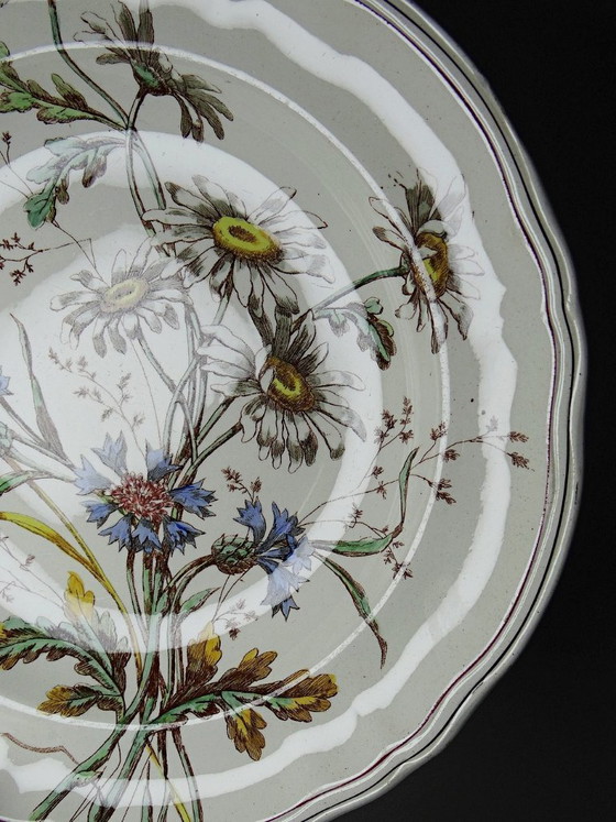 Image 1 of Antique Longchamp deep dish with polychrome ironstone daisies