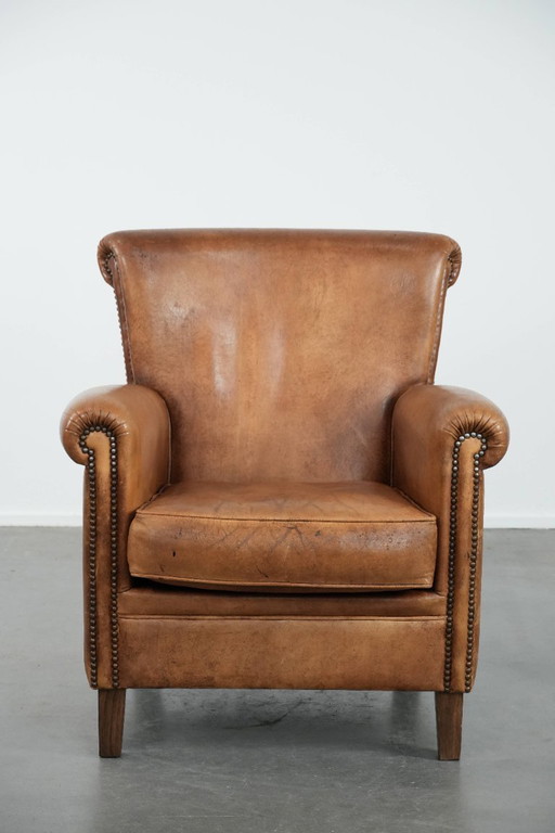 Poltrona vintage in pelle di pecora con carattere