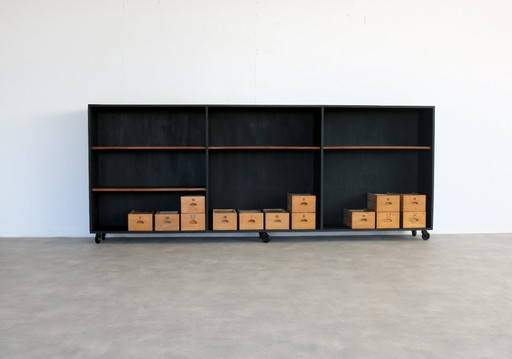 vintage wooden school cabinet with storage bins
