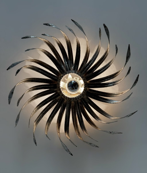Sunburst wall sconce in silver wrought iron, 1960s