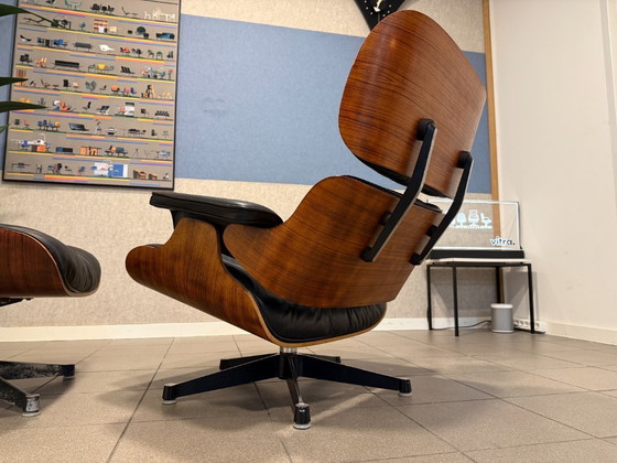 Image 1 of Herman Miller / Contura | Charles & Ray Eames | Lounge Chair & Ottoman | Rosewood & Black Leather | 1x Set