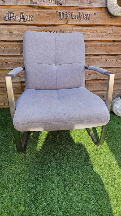 Fauteuil design en acier inoxydable gris