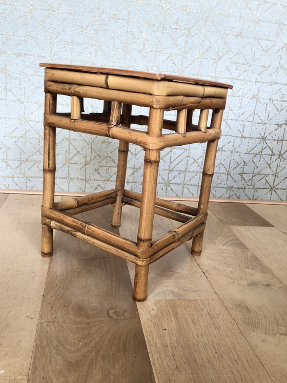 Image 1 of Set van 2 rotan bijzettafels uit het midden van de 20e eeuw