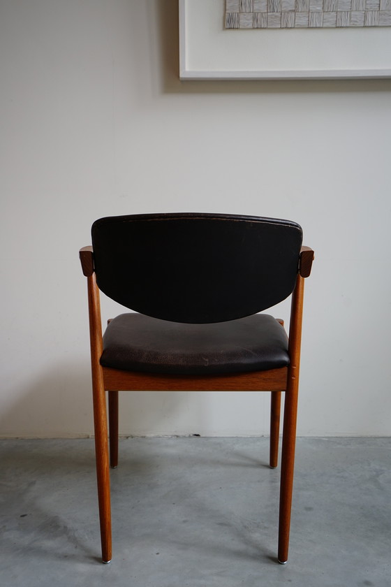 Image 1 of 6 Kai Kristiansen stoelen | Model 42 | Teak Leder patina
