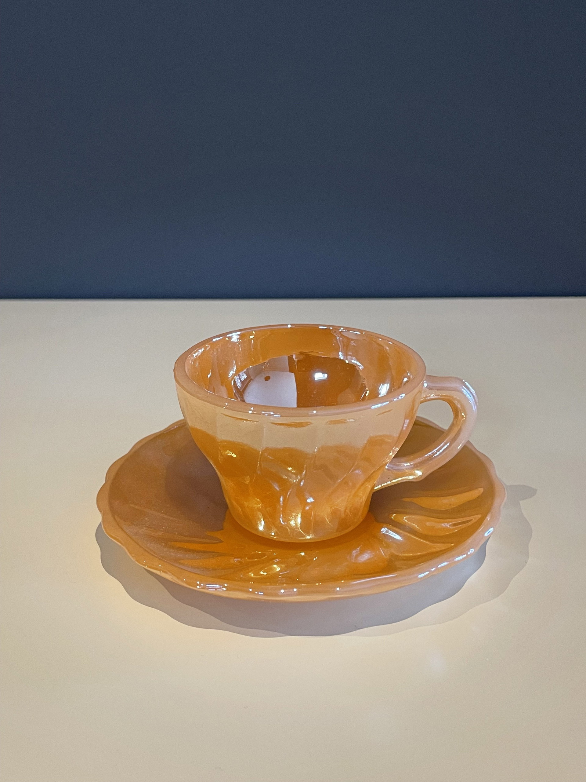 Vintage Fire-King peach gloss tea cup and saucer set | €100 | Whoppah