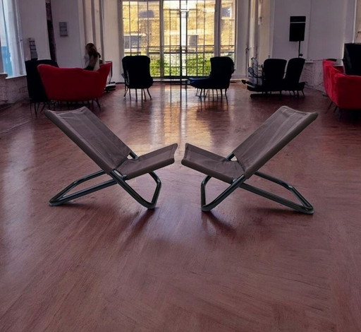 Pair of Cross x Cuneo lounge chairs