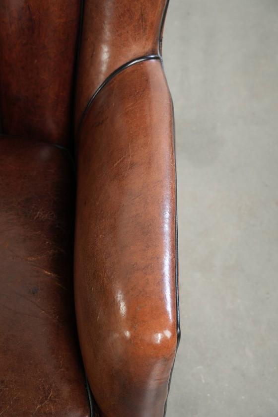 2 fauteuils en peau de mouton au design unique, avec passepoil noir et couleurs profondes. – Leather (photo 9 of 20)