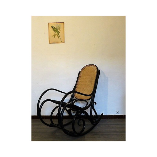 Sedia a dondolo in legno nero con seduta in vimini, anni '60 