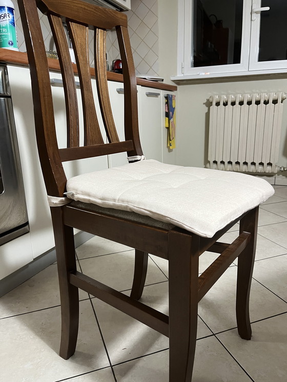 Image 1 of Table en bois et chaises assorties