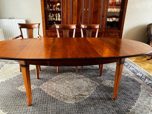 Cherry wood dining area with 6 chairs