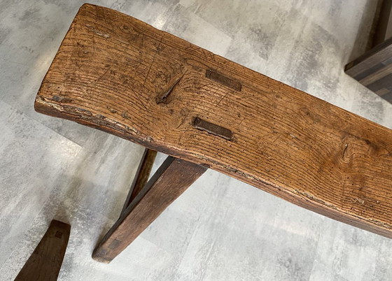 Image 1 of Twee massief eikenhouten boerenbanken van 214 cm voor een rustieke boerentafel uit de jaren 50.