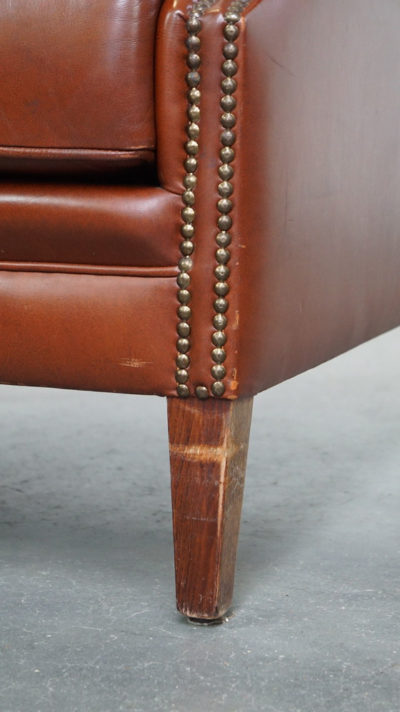 Image 1 of Fauteuil à oreilles en cuir de boeuf