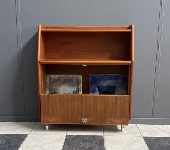 Image 1 of Teak tall sideboard on lucite legs 1960s