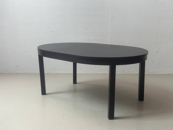 IKEA BJURSTA extendable dining table in black-brown – Wood (photo 11 of 14)