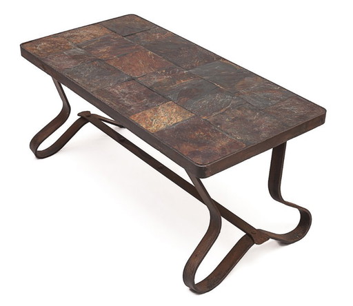 Brutalist coffee table by Adnet