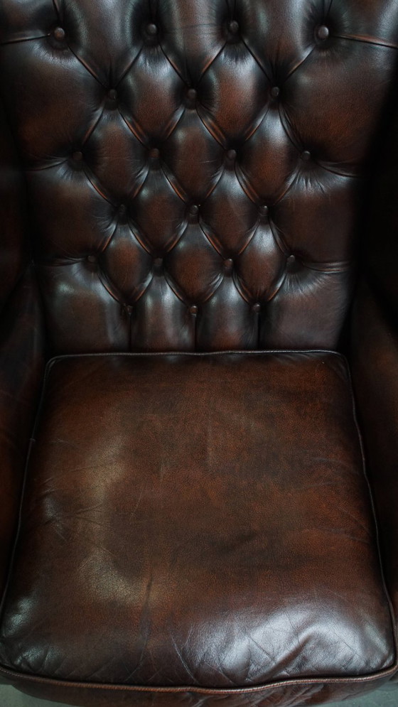 Image 1 of Bruine rundleren chesterfield oorfauteuil