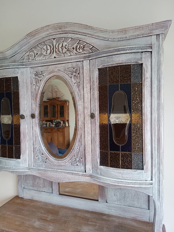 Image 1 of Antique sideboard with leaded glass and mirror