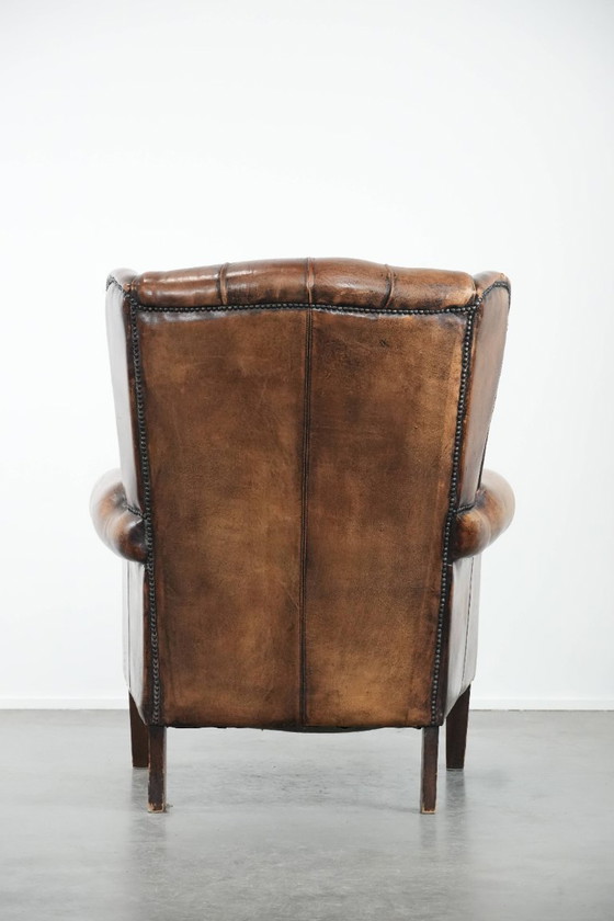 Image 1 of Unique large English-style sheepskin Chesterfield wing armchair