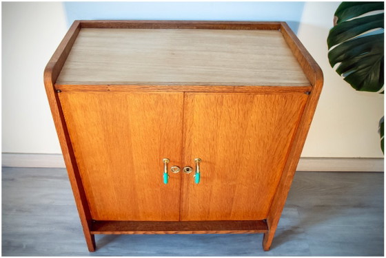 Image 1 of Sideboard with a fin-shaped profile, brass handles and scoubidou cord, 1950s