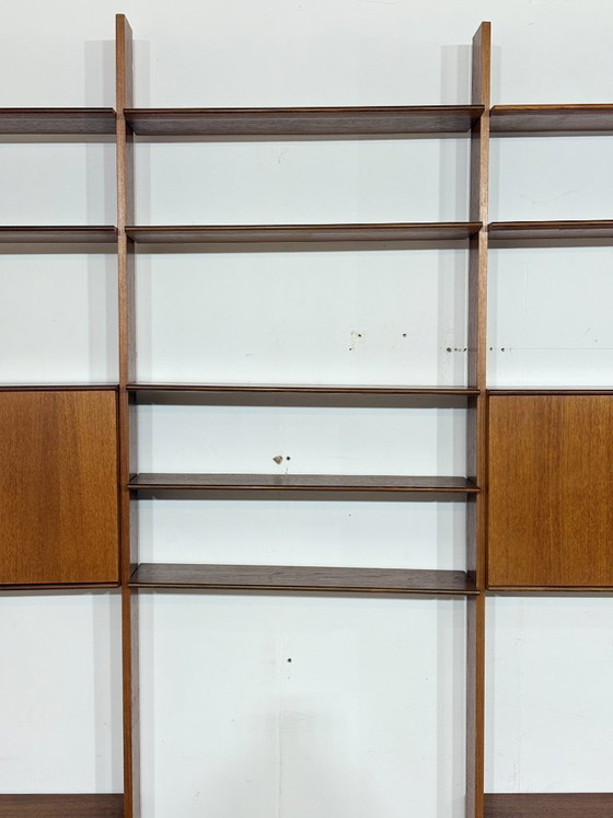 Modular mid-century wall shelf by interna-Peter Pedrides / Teak shelving system 1960s – Shelving unit, Wood (photo 12 of 27)