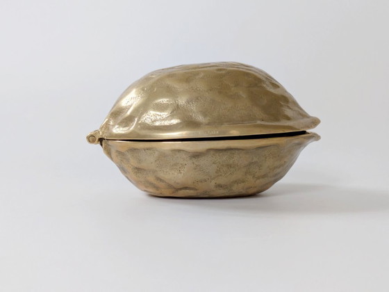 Image 1 of Cascanueces de nogal y latón de mediados de siglo | Decoración navideña de latón macizo