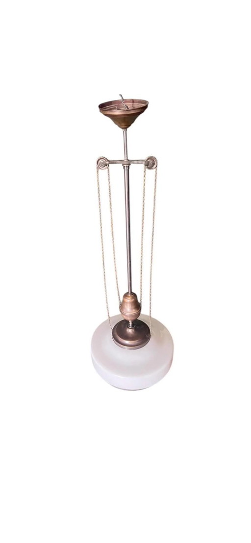 Original Viennese coffee house ceiling lamp in Art Nouveau style. Opal glass and brass ceiling light made around 1905/1910.