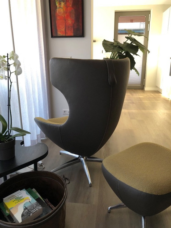 Image 1 of Leolux Carruzo-stoel met poef en hoofdsteun