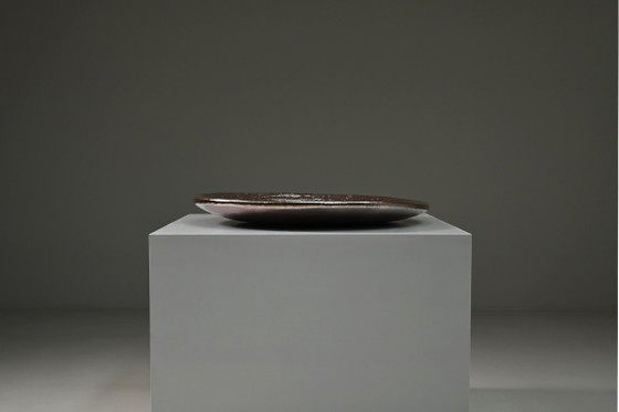 Large handmade metallic glazed ceramic bowl, circa 1980s–1990s. (photo 2 of 8)