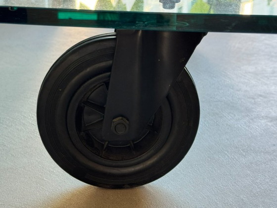 Glass coffee table on industrial wheels (photo 3 of 5)