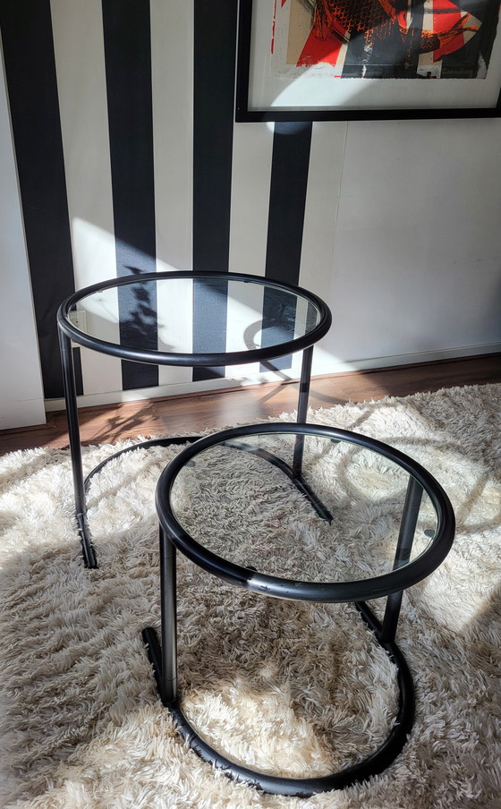 Image 1 of Post-Modern tubular frame nesting tables in black.