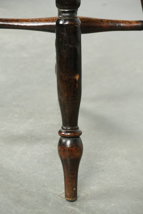 Image 1 of Antique English Windsor stool from the early 19th century with a unique oval shape