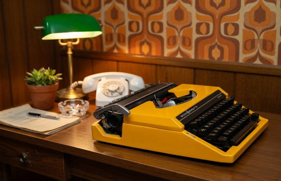 Image 1 of Canary yellow beauty: Sperry Remington Ten Forty portable typewriter (1970s)