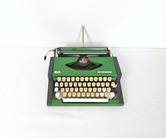 Image 1 of Vintage Green Working Typewriter / Green UNIS TBM De Luxe 1970's / Retro Office / Office Decor / Olympia / Mid Century Modern