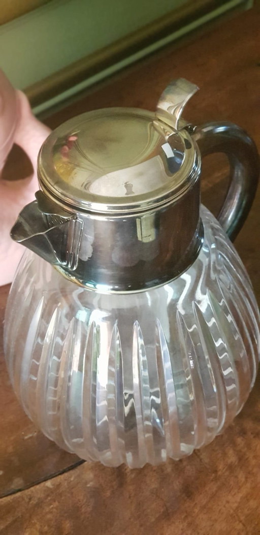 Vintage glazen en metalen sinaasappelsapkan uit de jaren 60.