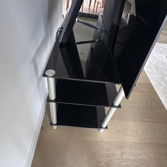 Image 1 of Black glass TV table